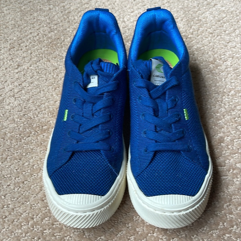 Cariuma blue sneakers. Lightly worn.